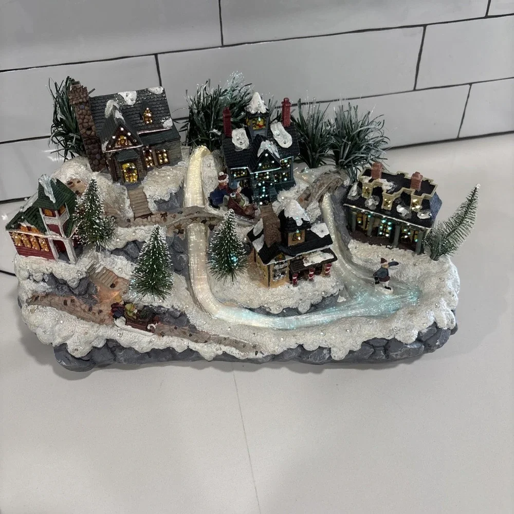Beautiful vintage fiber optic Christmas village that light up the city-Avon 2003